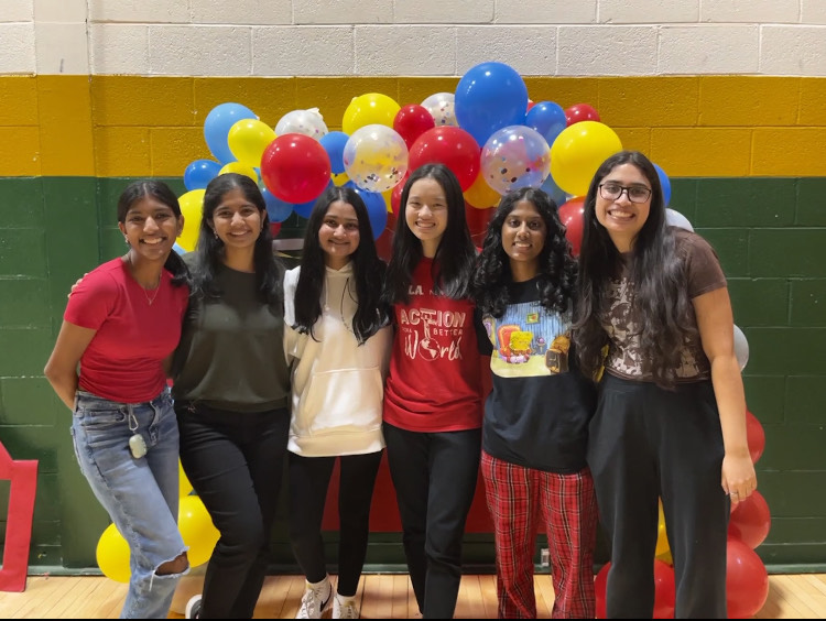 FCCLA board members decorate the gym for the Dance Marathon before students arrive.