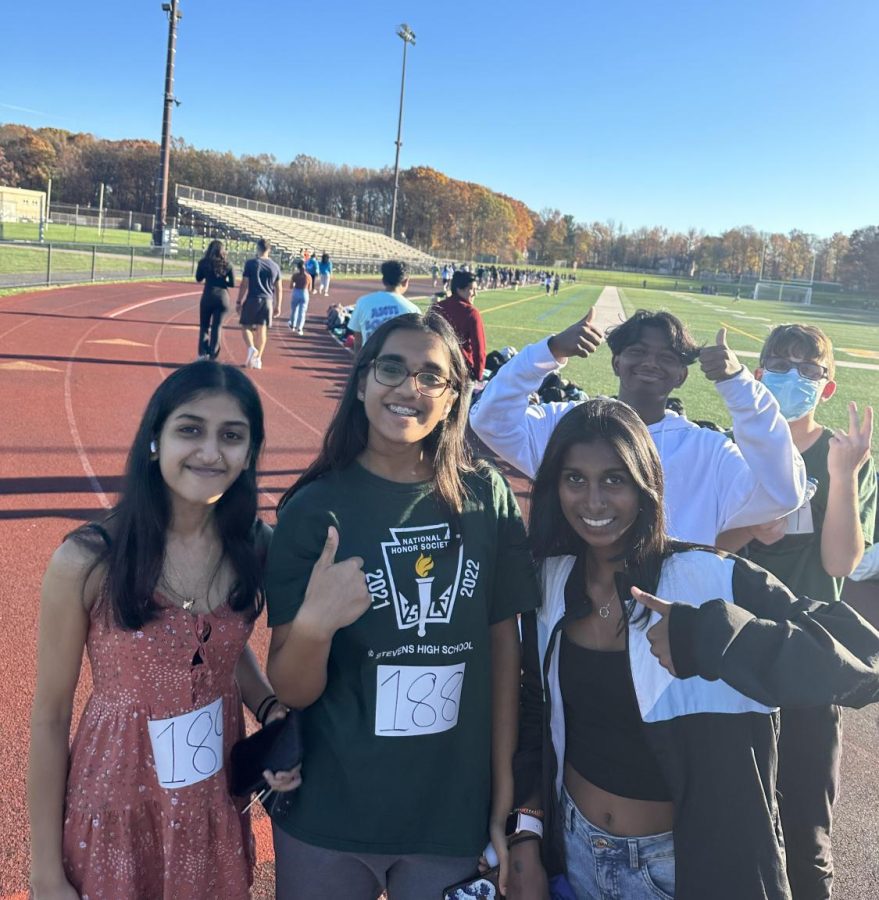 Seniors Hritika Shah, Khushi Sharma, and Ishaa Rajeshkannan participate in HOSA's Cancer Walk.