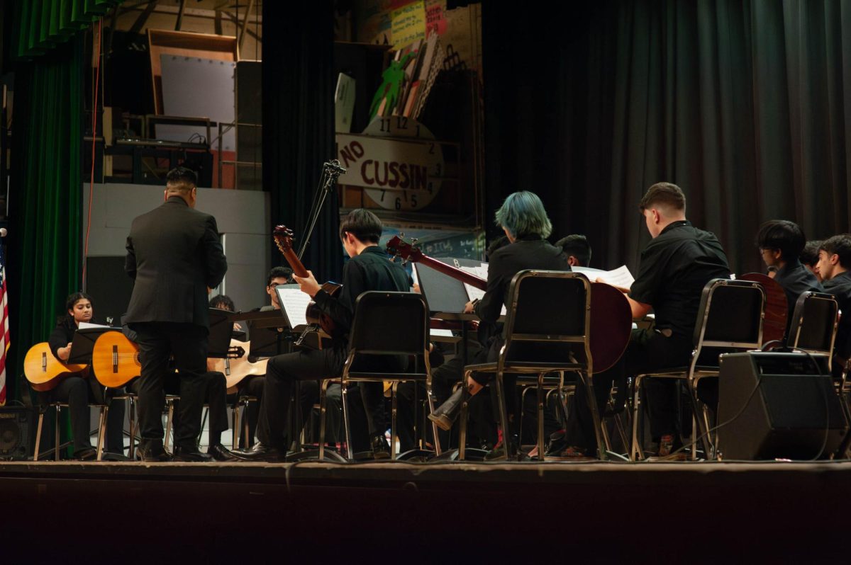 Mr. Huaman conducting the Guitar Ensemble